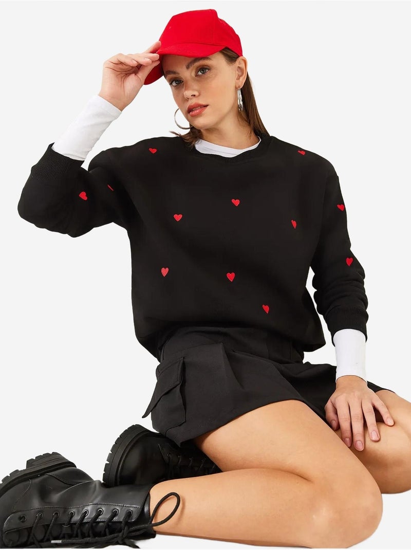Sweatshirt bordada de gola redonda e corte relaxed lucci Preto - Kiabi