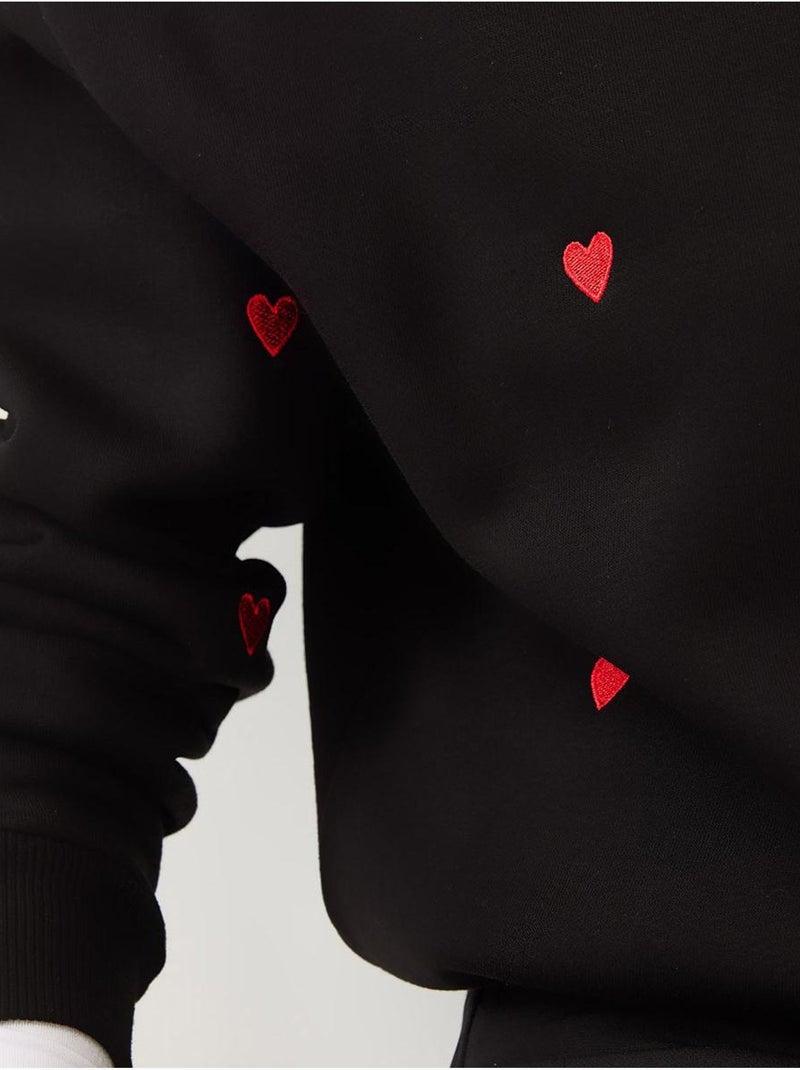 Sweatshirt bordada de gola redonda e corte relaxed lucci Preto - Kiabi