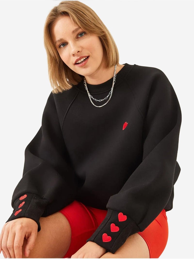 Sweatshirt bordada de gola redonda e manga comprida lucci Preto - Kiabi