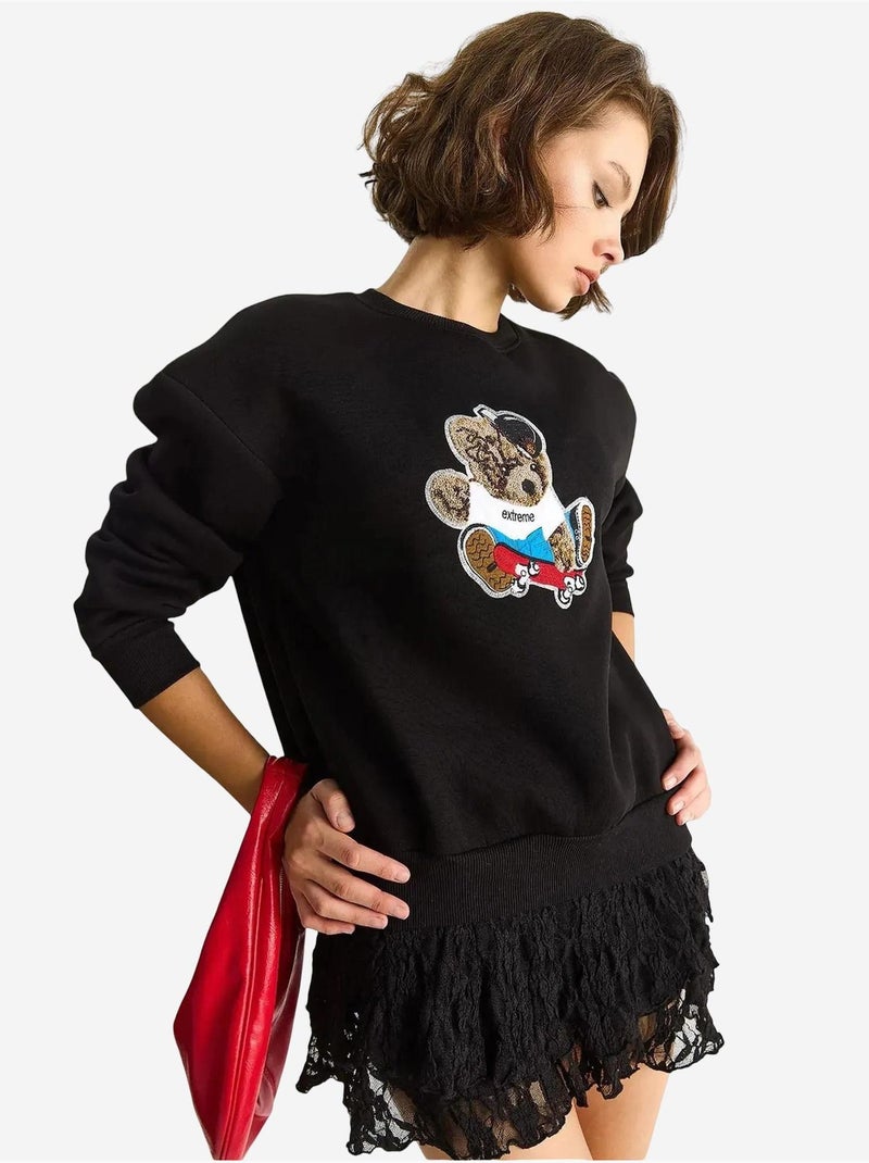 Sweatshirt bordada de gola redonda e manga comprida lucci Preto - Kiabi