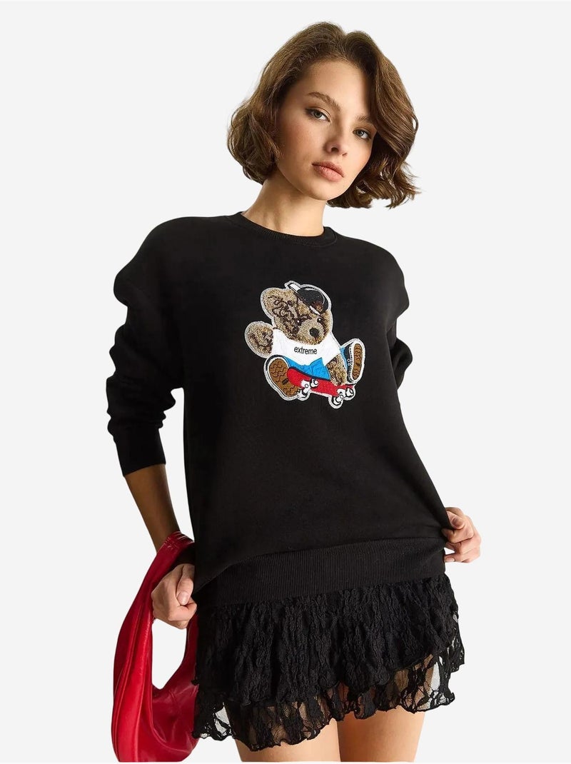 Sweatshirt bordada de gola redonda e manga comprida lucci Preto - Kiabi