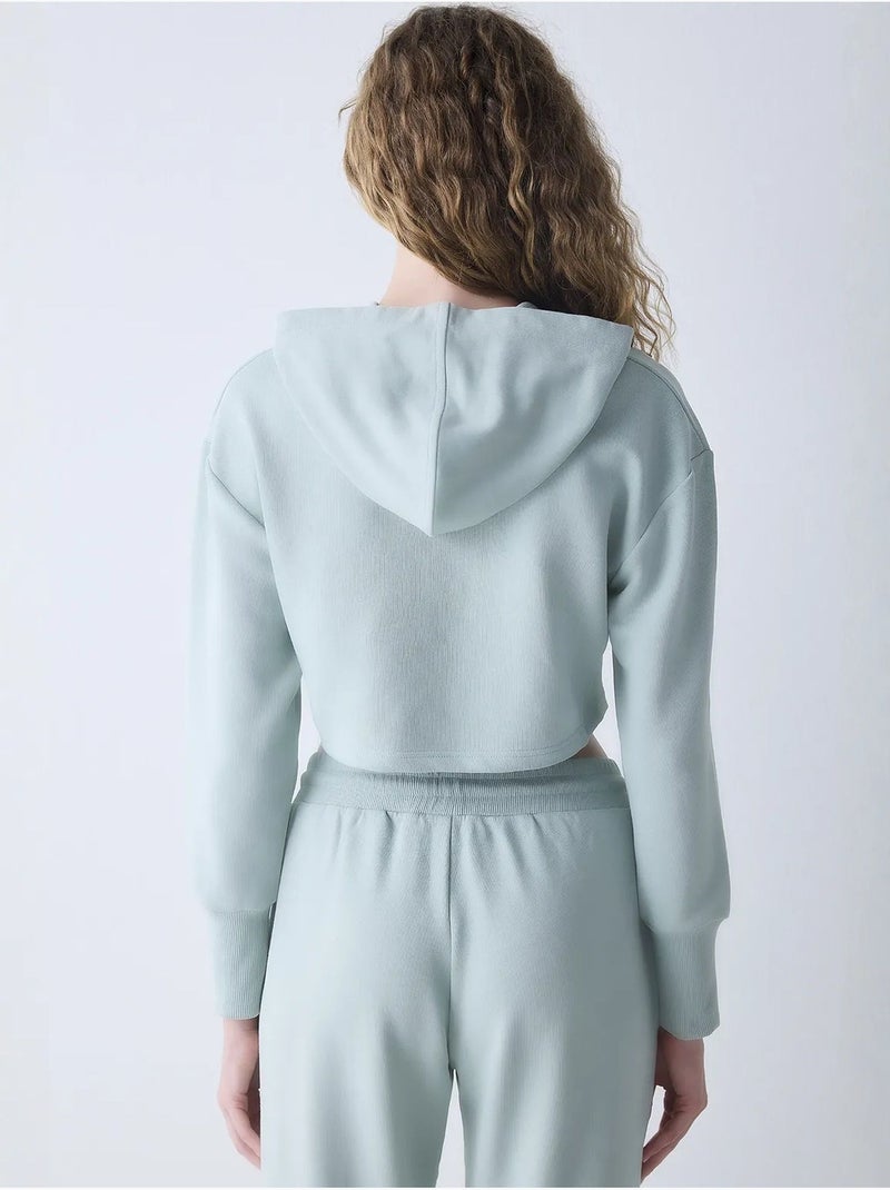 Sweatshirt claro com capuz e detalhes canelados penti Verde menta - Kiabi