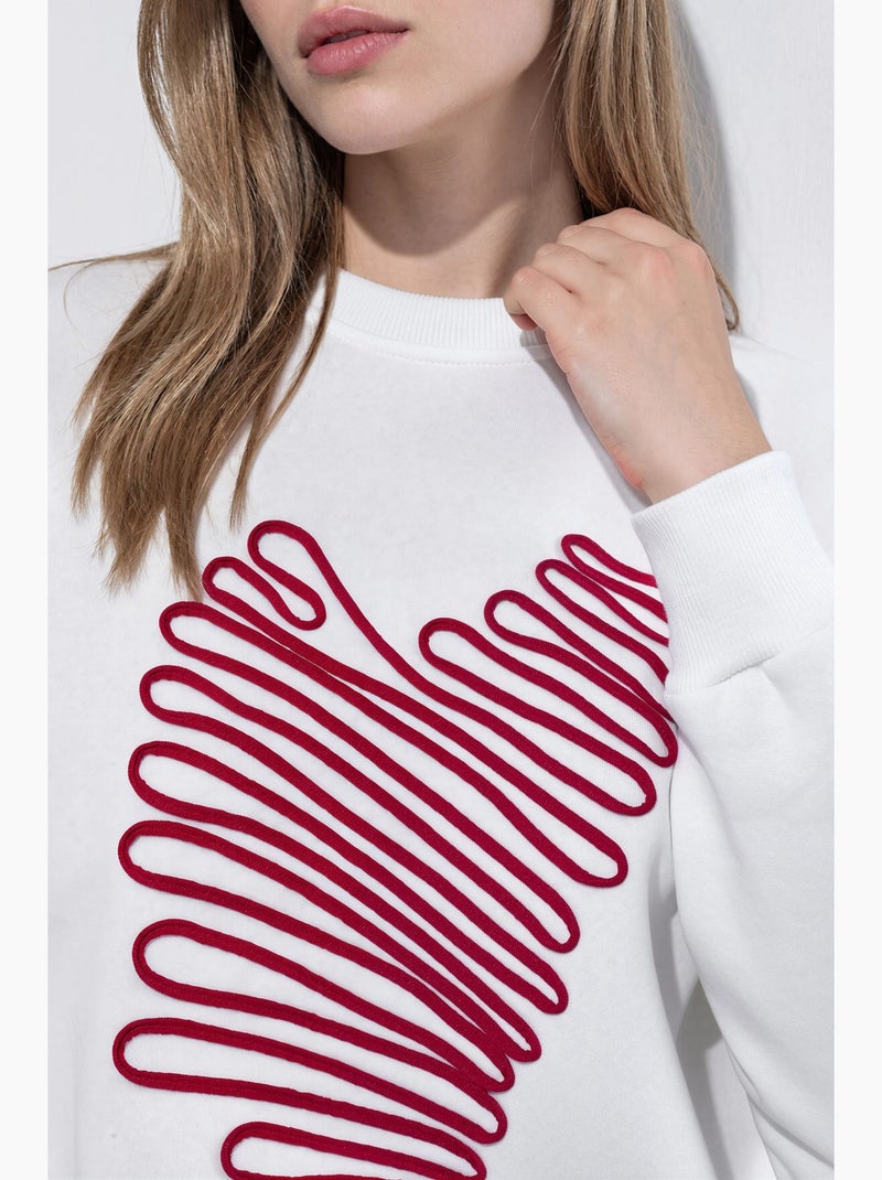 Sweatshirt com bordado de coração e gola redonda hiccup Creme - Kiabi