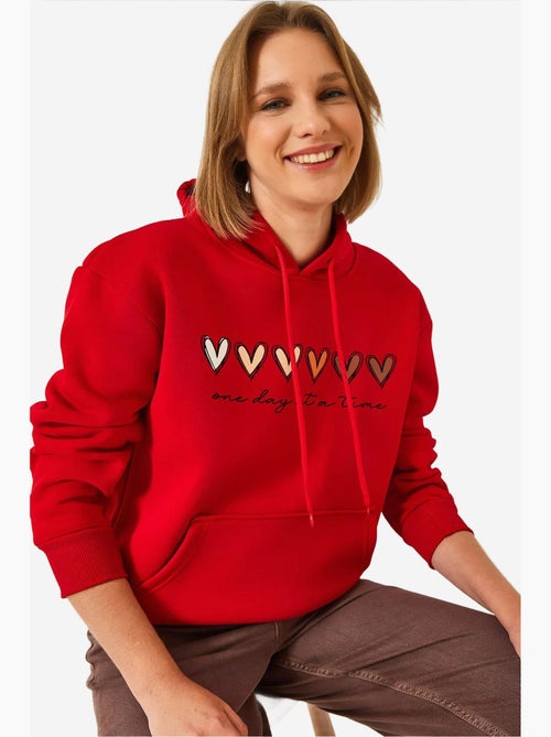 Sweatshirt com capuz e estampado de coração escovado de três fios lucci - Kiabi Sweatshirt com capuz e estampado de coração escovado de três fios lucci - Kiabi
