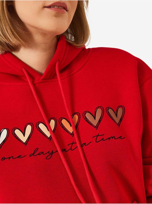 Sweatshirt com capuz e estampado de coração escovado de três fios lucci - Kiabi Sweatshirt com capuz e estampado de coração escovado de três fios lucci - Kiabi