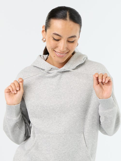 Sweatshirt com capuz lisa e bolso canguru - Kiabi Sweatshirt com capuz lisa e bolso canguru - Kiabi