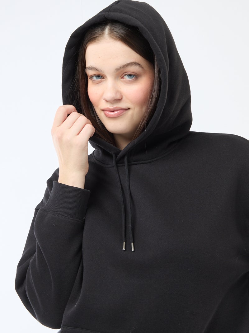 Sweatshirt com capuz liso e bolso canguru Preto - Kiabi