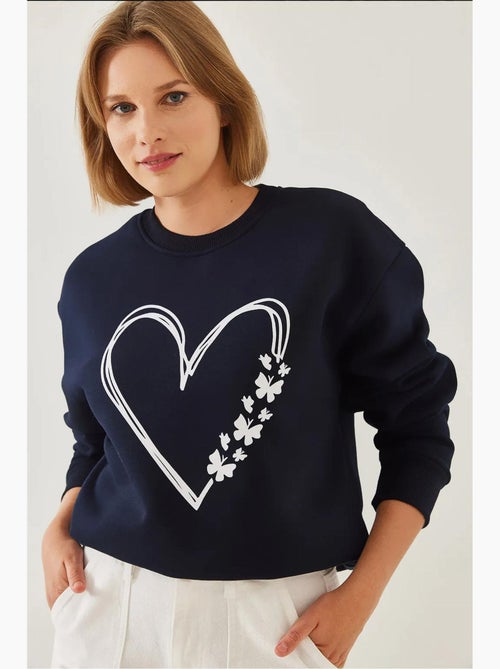 Sweatshirt com estampado de corações e gola redonda escovada lucci - Kiabi Sweatshirt com estampado de corações e gola redonda escovada lucci - Kiabi