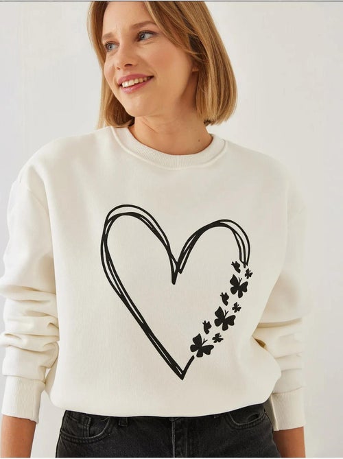 Sweatshirt com estampado de corações e gola redonda escovada lucci - Kiabi Sweatshirt com estampado de corações e gola redonda escovada lucci - Kiabi