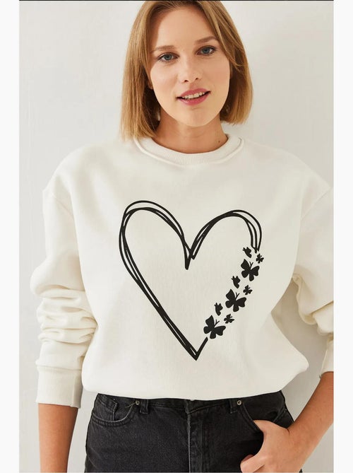 Sweatshirt com estampado de corações e gola redonda escovada lucci - Kiabi Sweatshirt com estampado de corações e gola redonda escovada lucci - Kiabi