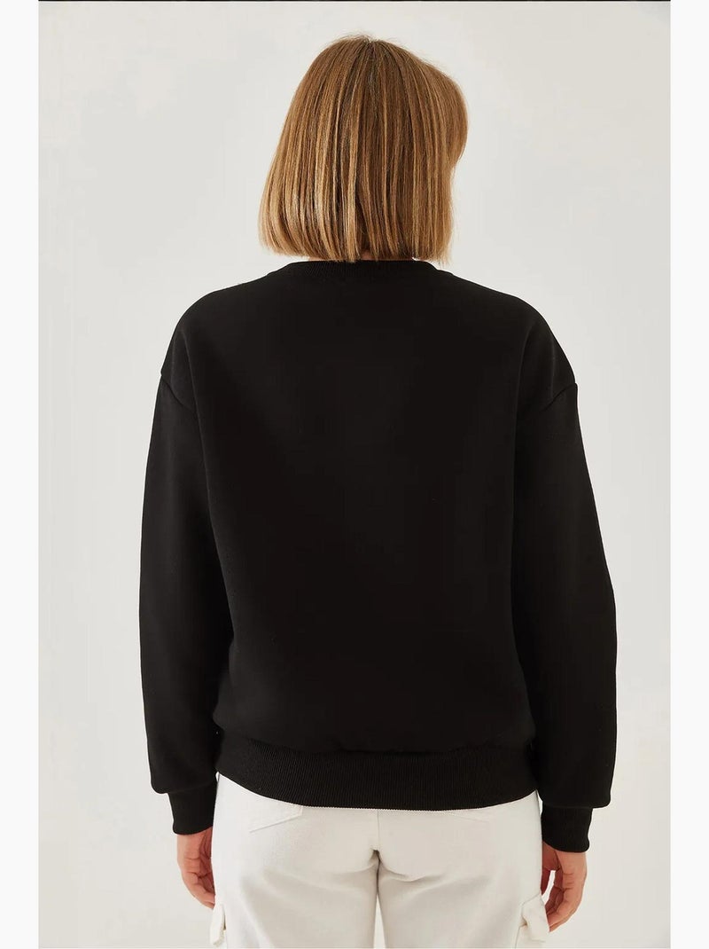 Sweatshirt com estampado de corações e gola redonda escovada lucci Preto - Kiabi