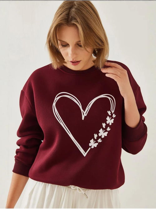 Sweatshirt com estampado de corações e gola redonda escovada lucci - Kiabi Sweatshirt com estampado de corações e gola redonda escovada lucci - Kiabi