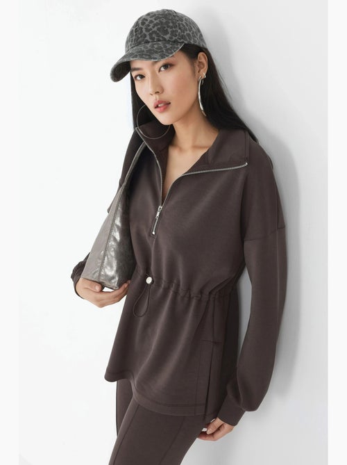 Sweatshirt com gola com fecho e cintura ajustável busem - Kiabi Sweatshirt com gola com fecho e cintura ajustável busem - Kiabi