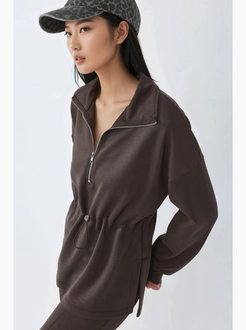 Sweatshirt com gola com fecho e cintura ajustável busem - Kiabi Sweatshirt com gola com fecho e cintura ajustável busem - Kiabi