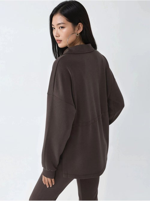 Sweatshirt com gola com fecho e cintura ajustável busem - Kiabi Sweatshirt com gola com fecho e cintura ajustável busem - Kiabi