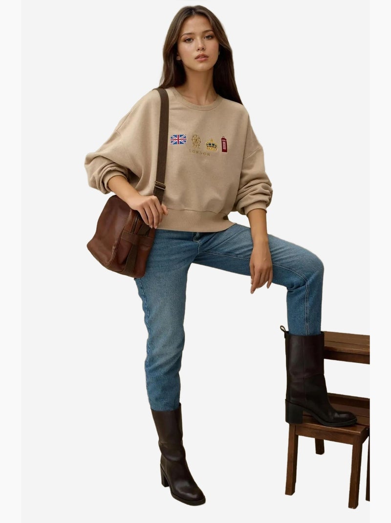 Sweatshirt com gola redonda bordado hiccup Bege - Kiabi