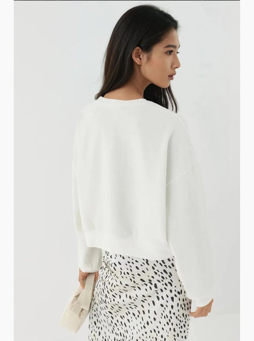 Sweatshirt com gola redonda bordado hiccup - Kiabi Sweatshirt com gola redonda bordado hiccup - Kiabi