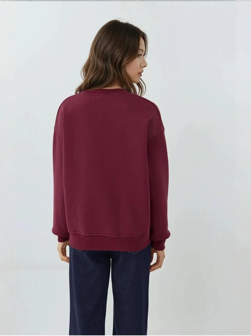 Sweatshirt com gola redonda bordado hiccup - Kiabi Sweatshirt com gola redonda bordado hiccup - Kiabi
