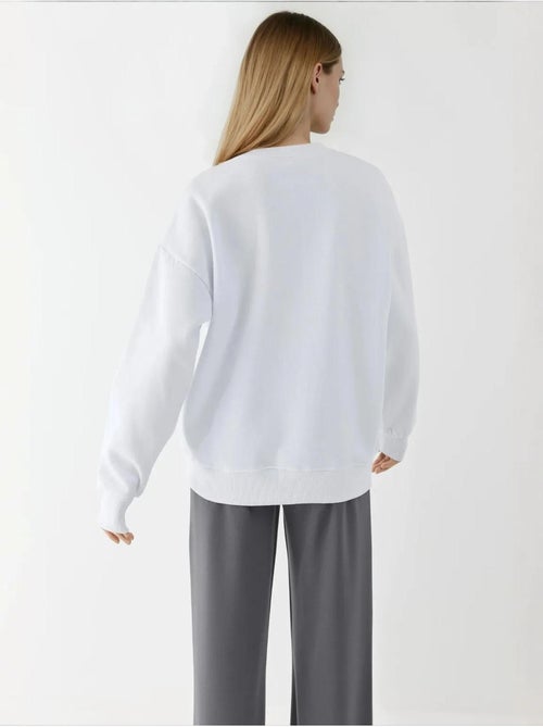 Sweatshirt com gola redonda estampada hiccup - Kiabi Sweatshirt com gola redonda estampada hiccup - Kiabi