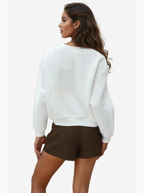 Sweatshirt de algodão bordado com ajuste descontraído hiccup - Kiabi Sweatshirt de algodão bordado com ajuste descontraído hiccup - Kiabi