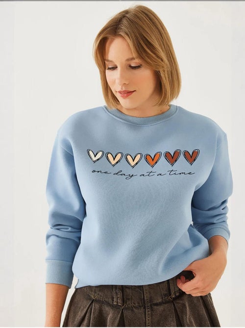 Sweatshirt de gola redonda com estampado de corações lucci - Kiabi