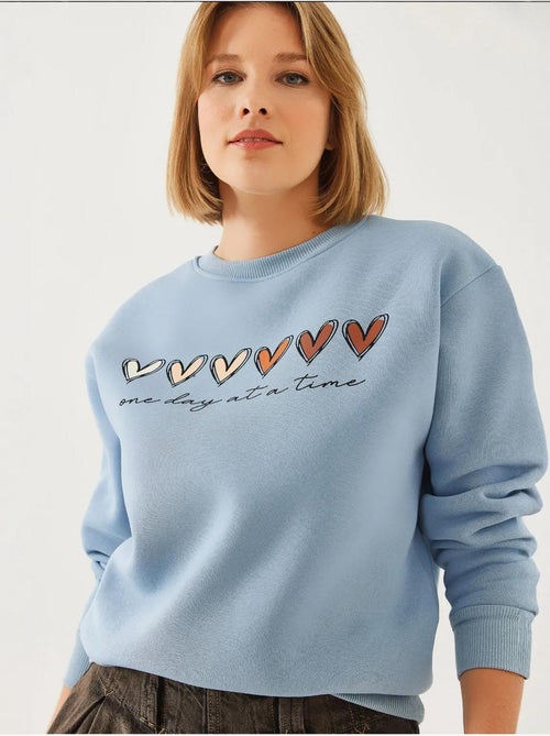 Sweatshirt de gola redonda com estampado de corações lucci - Kiabi