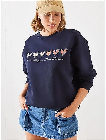 Sweatshirt de gola redonda com estampado de corações lucci
