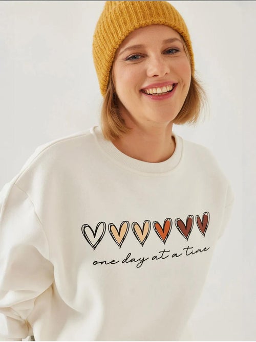 Sweatshirt de gola redonda com estampado de corações lucci - Kiabi