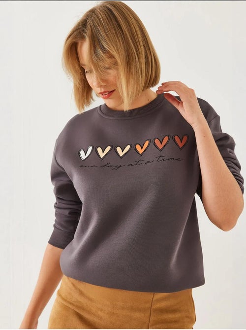 Sweatshirt de gola redonda com estampado de corações lucci - Kiabi
