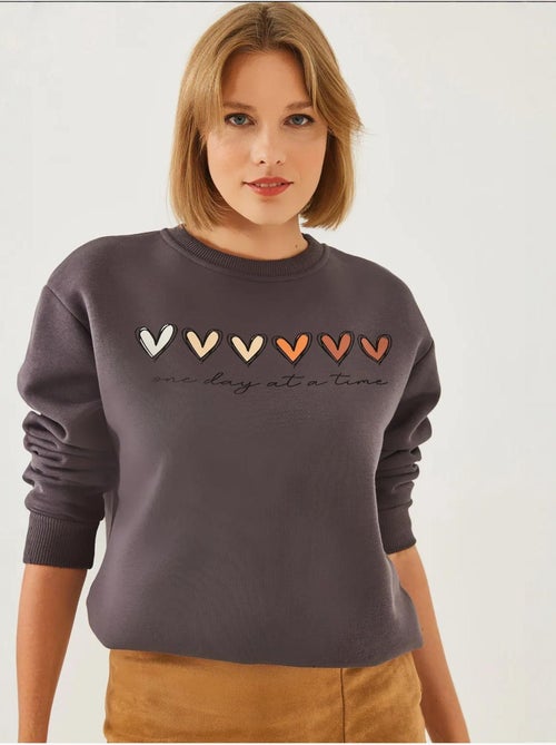 Sweatshirt de gola redonda com estampado de corações lucci - Kiabi