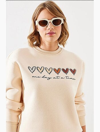 Sweatshirt de gola redonda com estampado de corações lucci