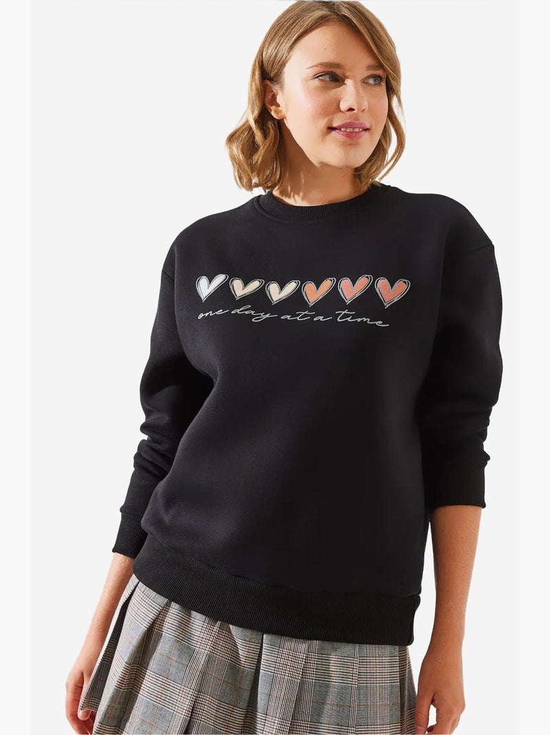 Sweatshirt de gola redonda com estampado de corações lucci Preto - Kiabi