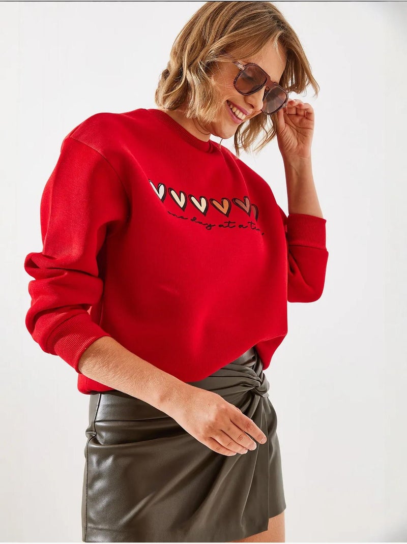 Sweatshirt de gola redonda com estampado de corações lucci Vermelho - Kiabi