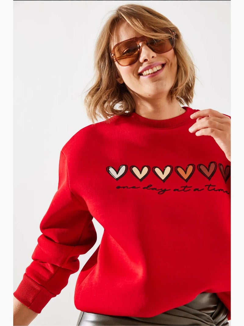 Sweatshirt de gola redonda com estampado de corações lucci Vermelho - Kiabi