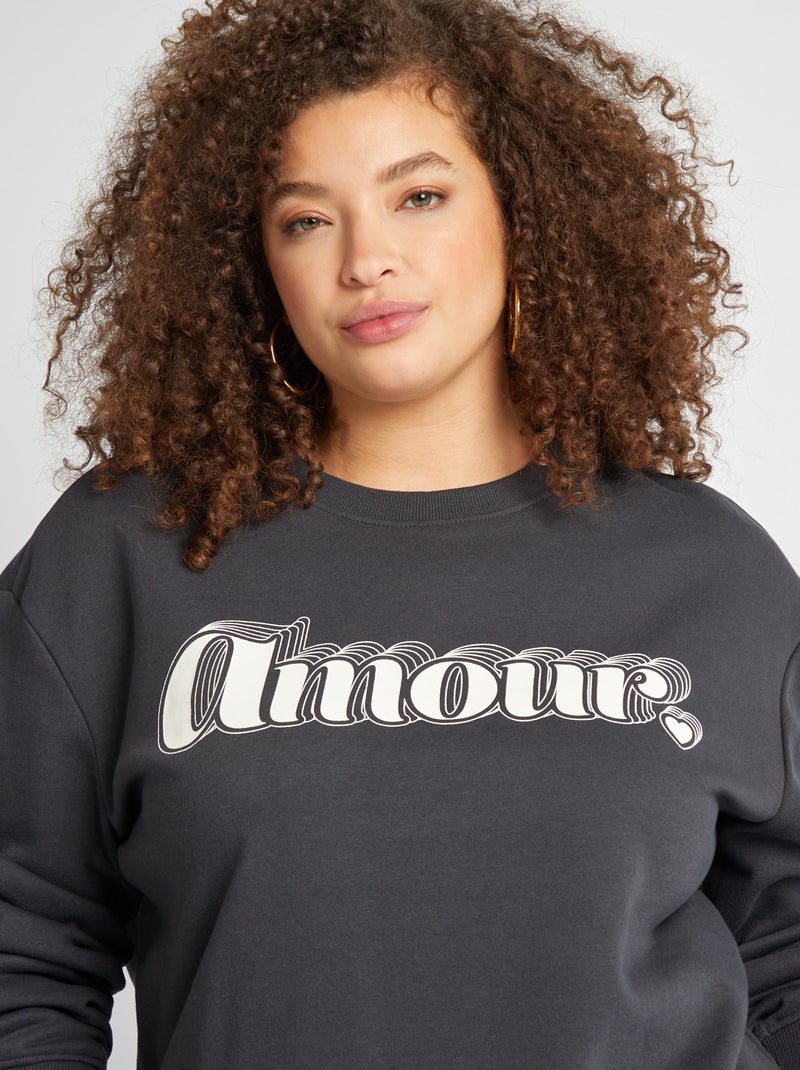 Sweatshirt de gola redonda com estampado PRETO - Kiabi