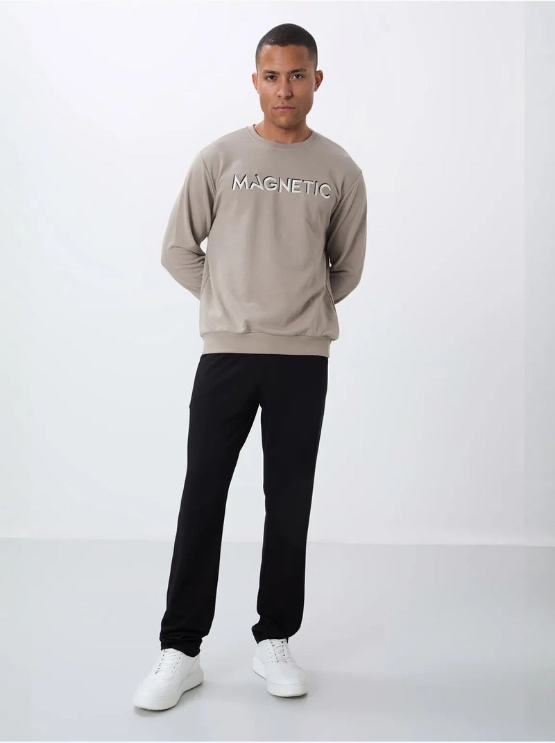 Sweatshirt de gola redonda com estampado tommy Areia - Kiabi