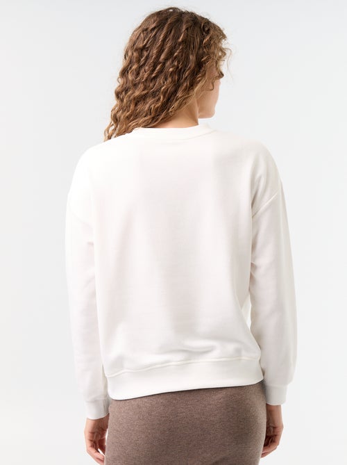 Sweatshirt de gola redonda com inscrição à frente - Kiabi Sweatshirt de gola redonda com inscrição à frente - Kiabi
