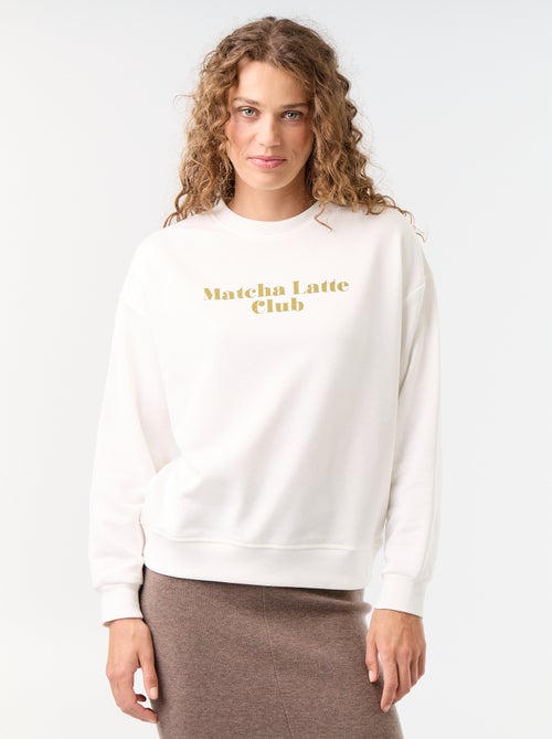 Sweatshirt de gola redonda com inscrição à frente - Kiabi Sweatshirt de gola redonda com inscrição à frente - Kiabi