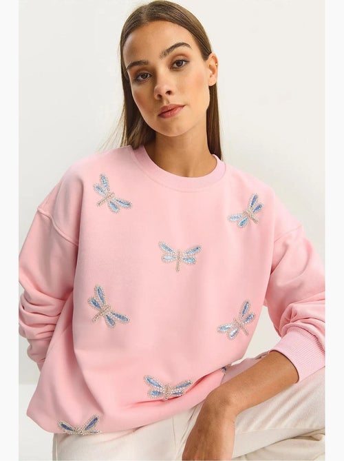 Sweatshirt de gola redonda com libélulas bordadas lucci - Kiabi Sweatshirt de gola redonda com libélulas bordadas lucci - Kiabi