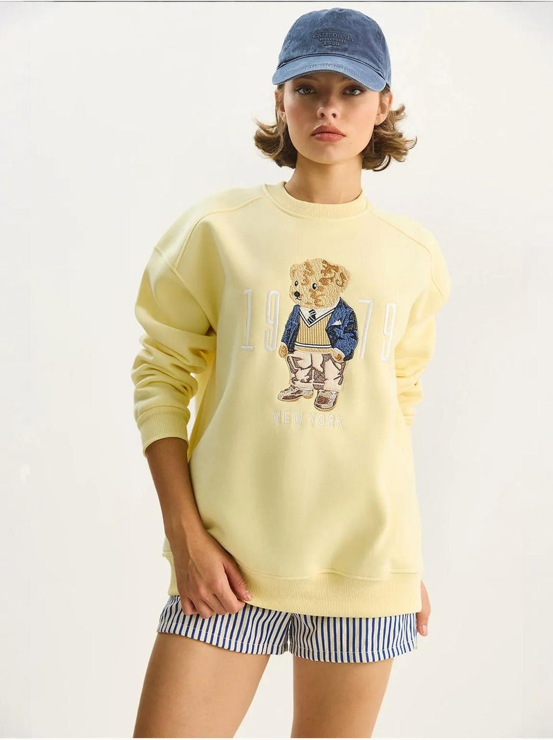 Sweatshirt de gola redonda estampada com corte relaxed lucci Amarelo - Kiabi