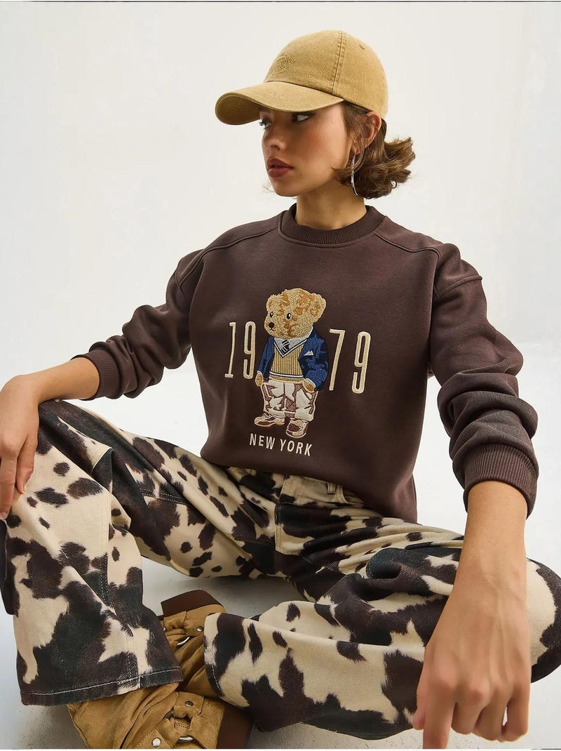 Sweatshirt de gola redonda estampada com corte relaxed lucci Castanho-chocolate - Kiabi