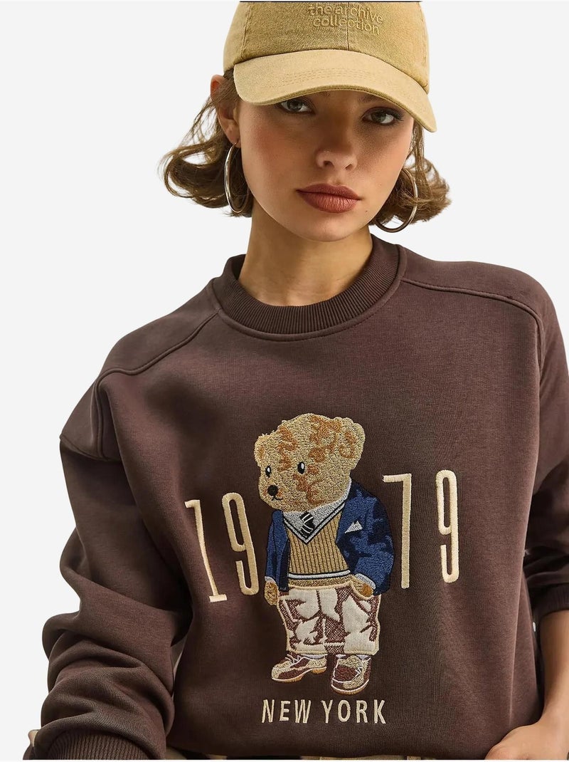 Sweatshirt de gola redonda estampada com corte relaxed lucci Castanho-chocolate - Kiabi