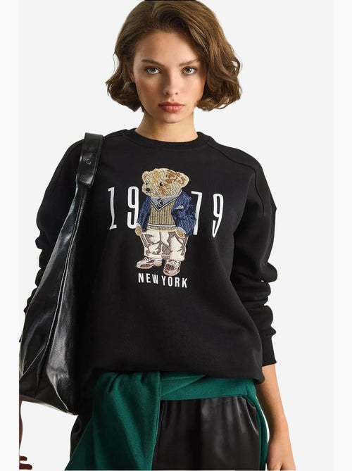Sweatshirt de gola redonda estampada com corte relaxed lucci - Kiabi Sweatshirt de gola redonda estampada com corte relaxed lucci - Kiabi