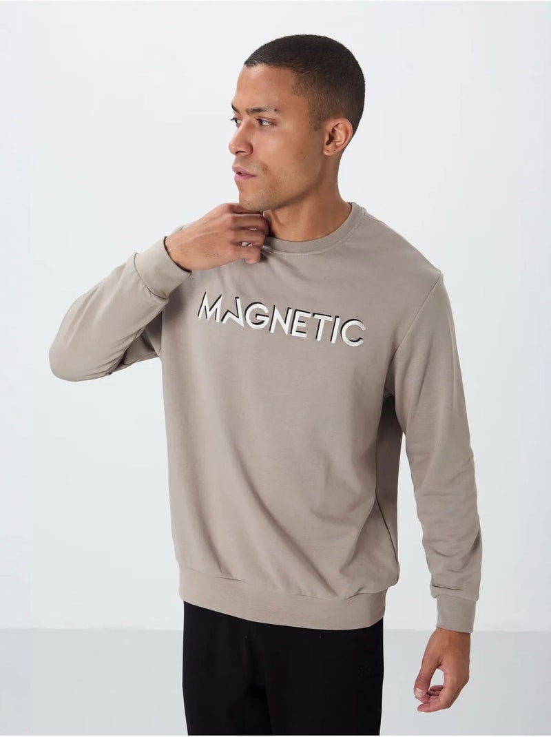 Sweatshirt de homem com estampado e gola redonda tommy Areia - Kiabi