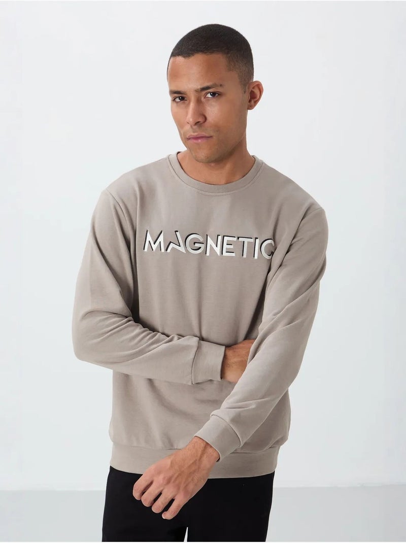 Sweatshirt de homem com estampado e gola redonda tommy Areia - Kiabi