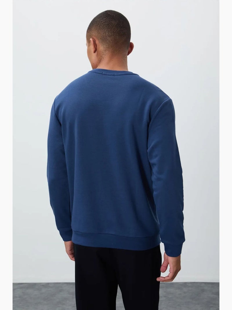 Sweatshirt de homem com estampado e gola redonda tommy Azul - Kiabi