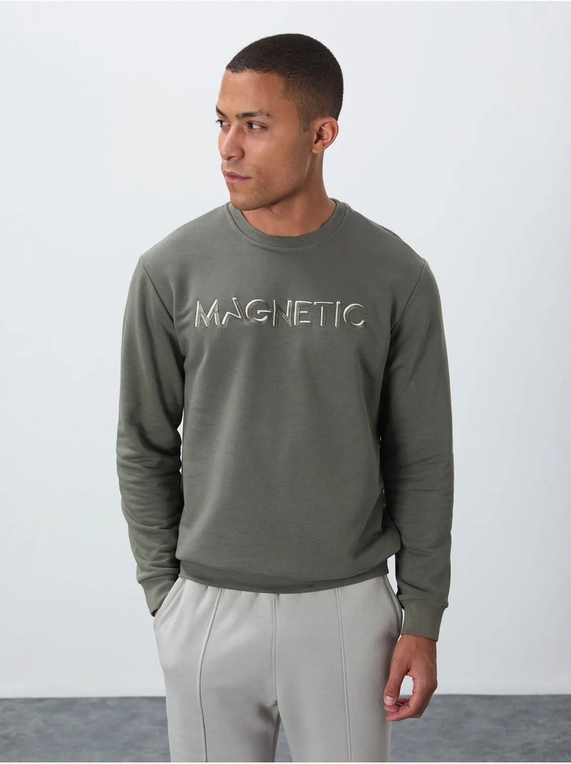 Sweatshirt de homem com estampado e gola redonda tommy Cáqui - Kiabi