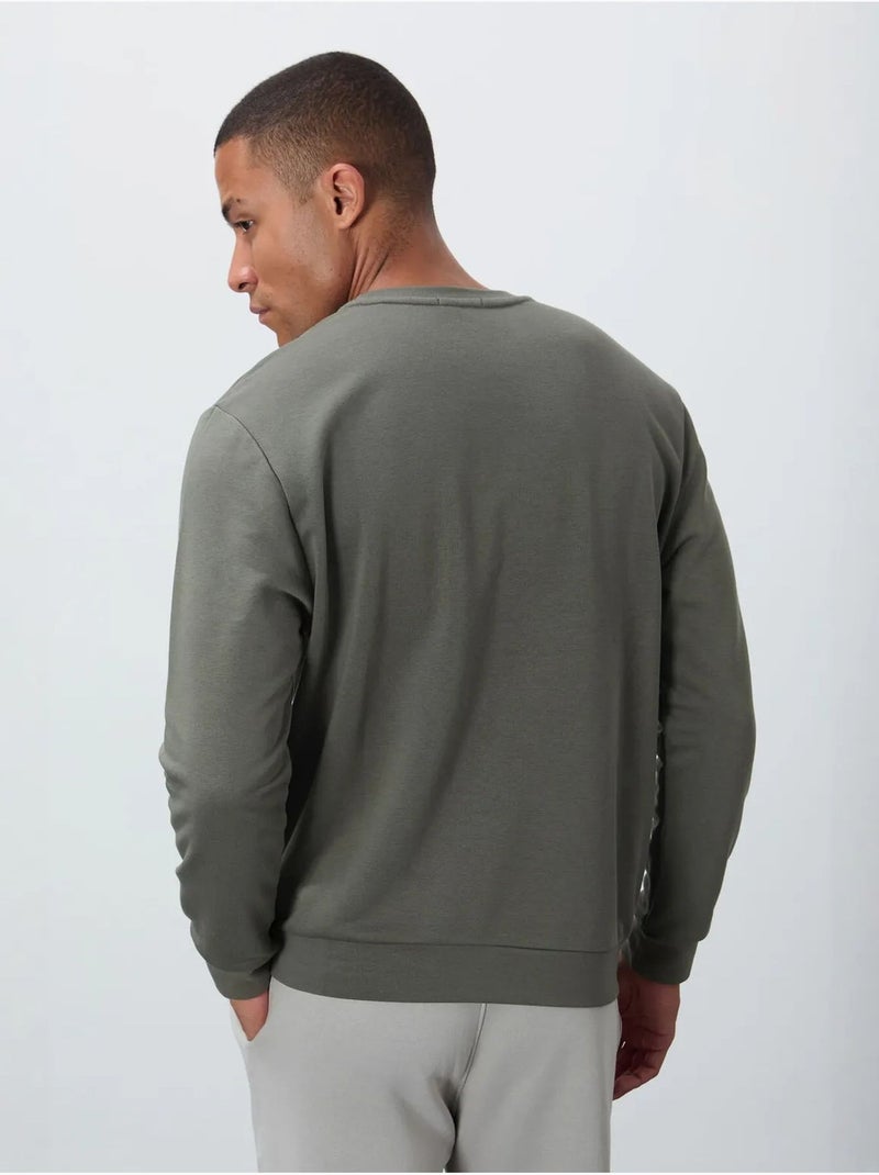 Sweatshirt de homem com estampado e gola redonda tommy Cáqui - Kiabi
