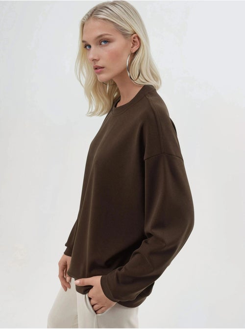 Sweatshirt de malha relaxed fit com decote redondo busem - Kiabi Sweatshirt de malha relaxed fit com decote redondo busem - Kiabi