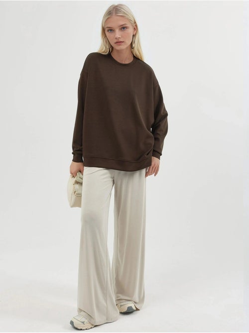 Sweatshirt de malha relaxed fit com decote redondo busem - Kiabi Sweatshirt de malha relaxed fit com decote redondo busem - Kiabi
